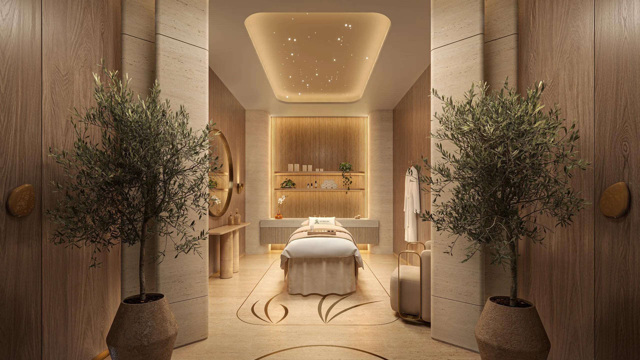 Interior of a spa treatment room with a massage bed, decorative plants, and warm lighting