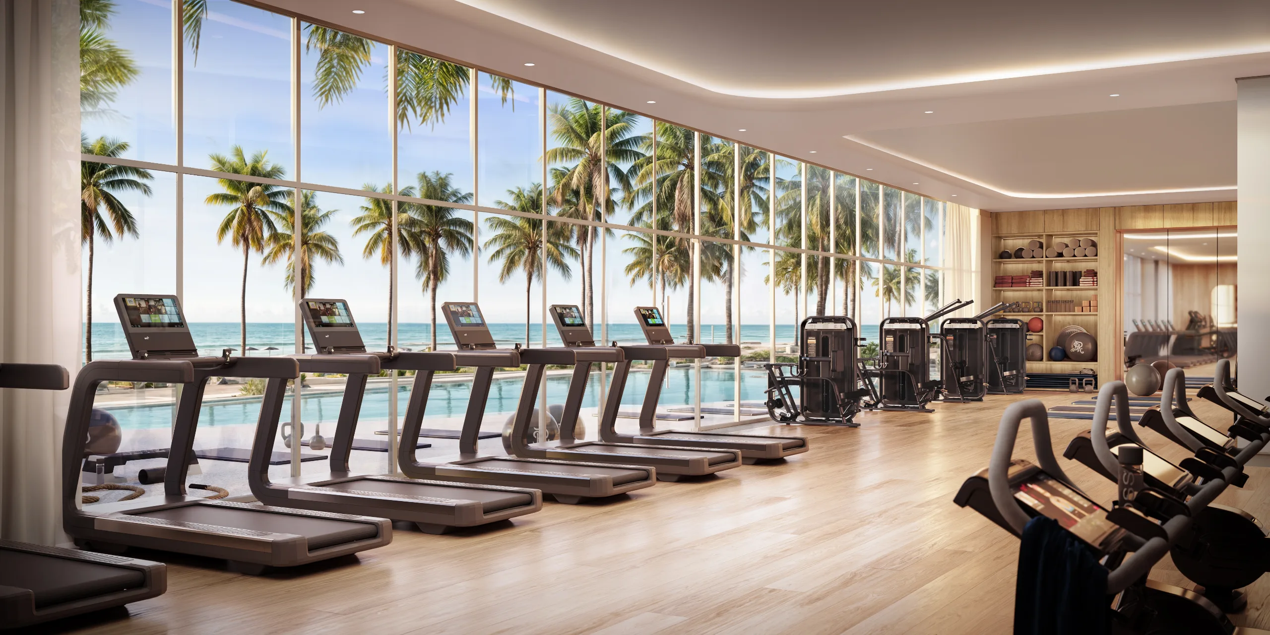 Fitness center with treadmills facing the ocean